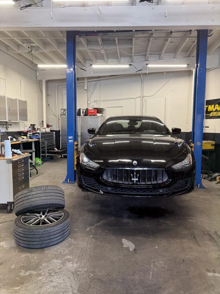 Bass working on brake service